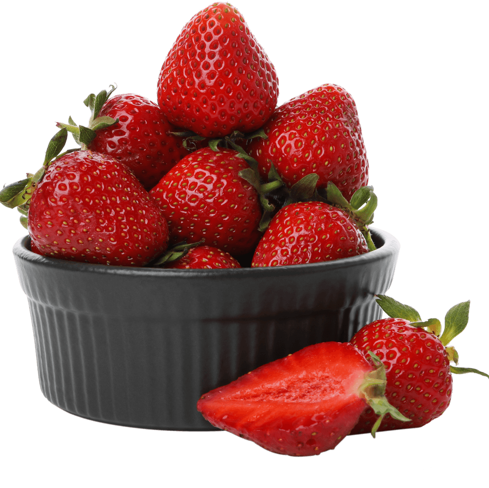 Strawberries in a dark bowl with a cut half beside it